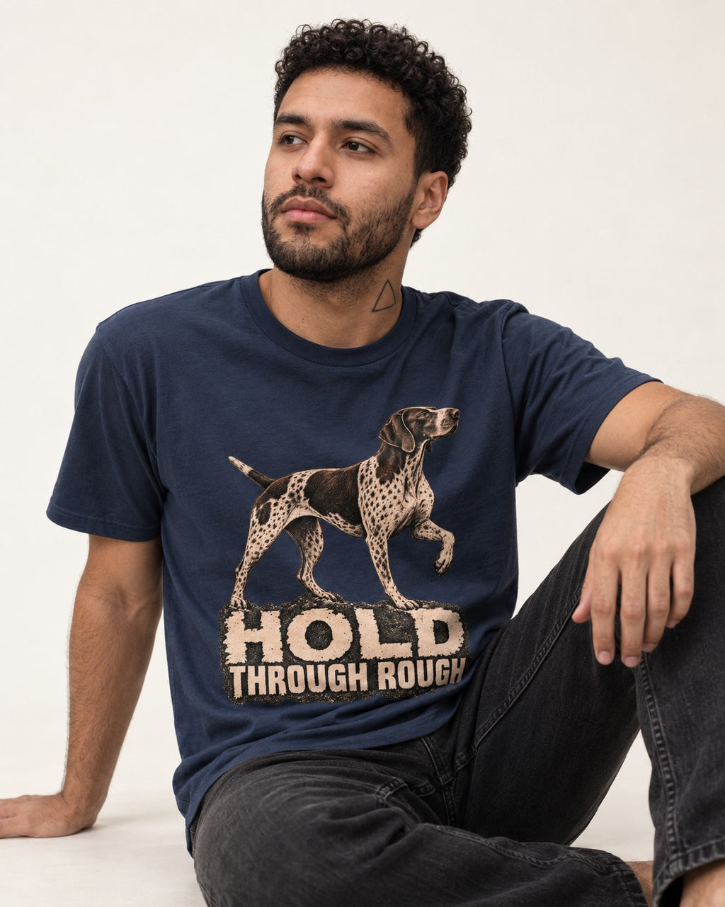 German Shorthaired Pointer Hold Through Rough Vintage Graphic T-Shirt in Navy, worn by a seated model