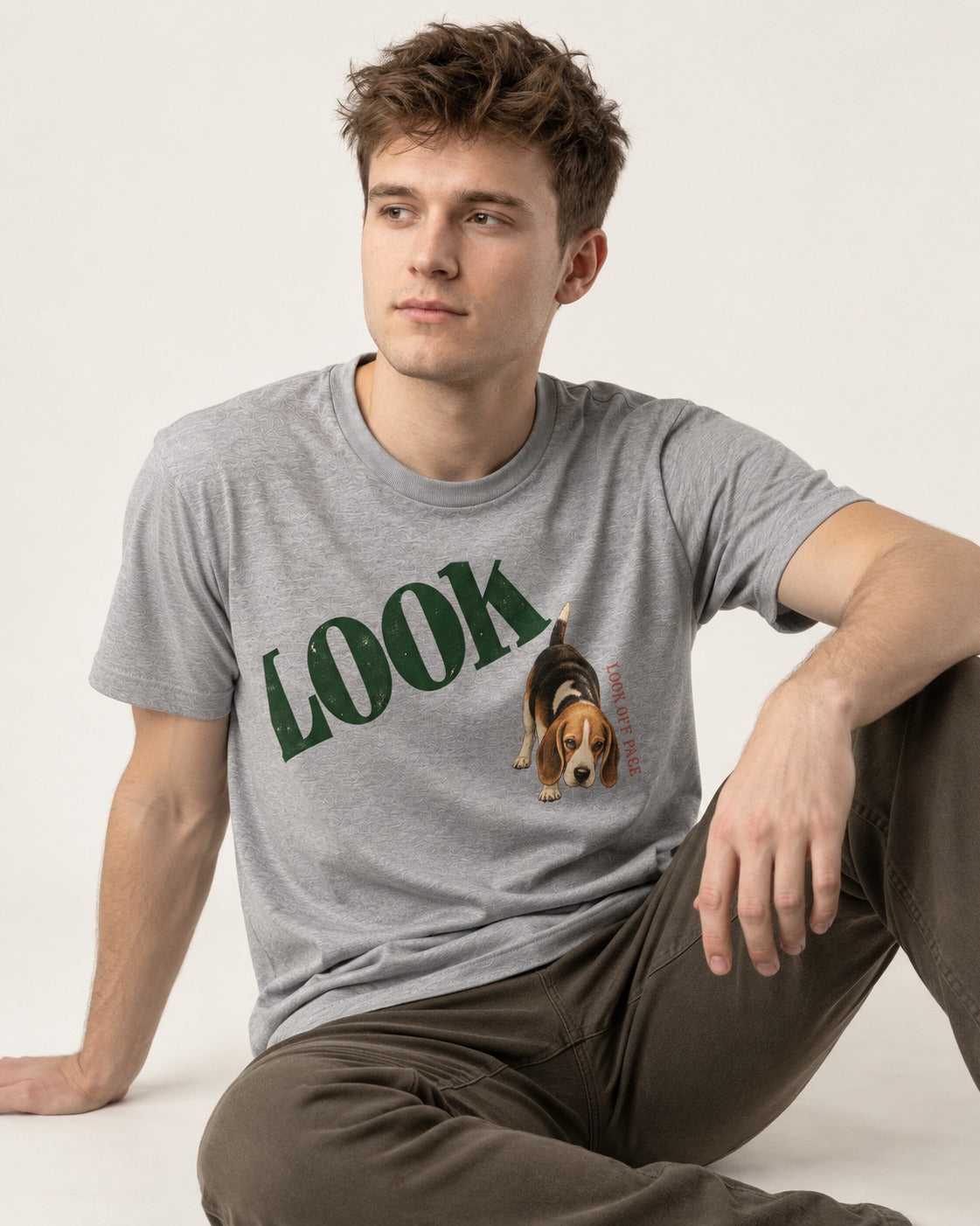 Beagle Look Off Page T-Shirt in Sport Grey, worn by a seated model