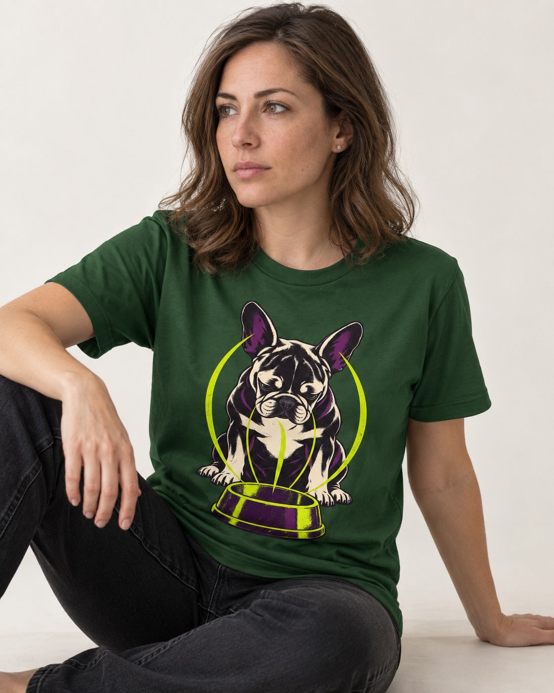 Frenchie Bowl Gravity Graphic T-Shirt in Forest Green, worn by a seated model