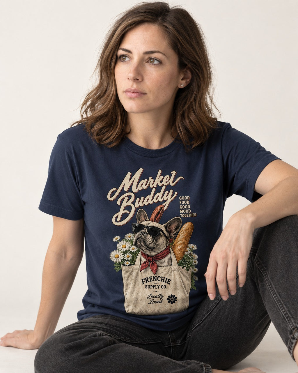 Frenchie Market Buddy Grocery Tote Graphic T-Shirt in Navy, worn by a seated model