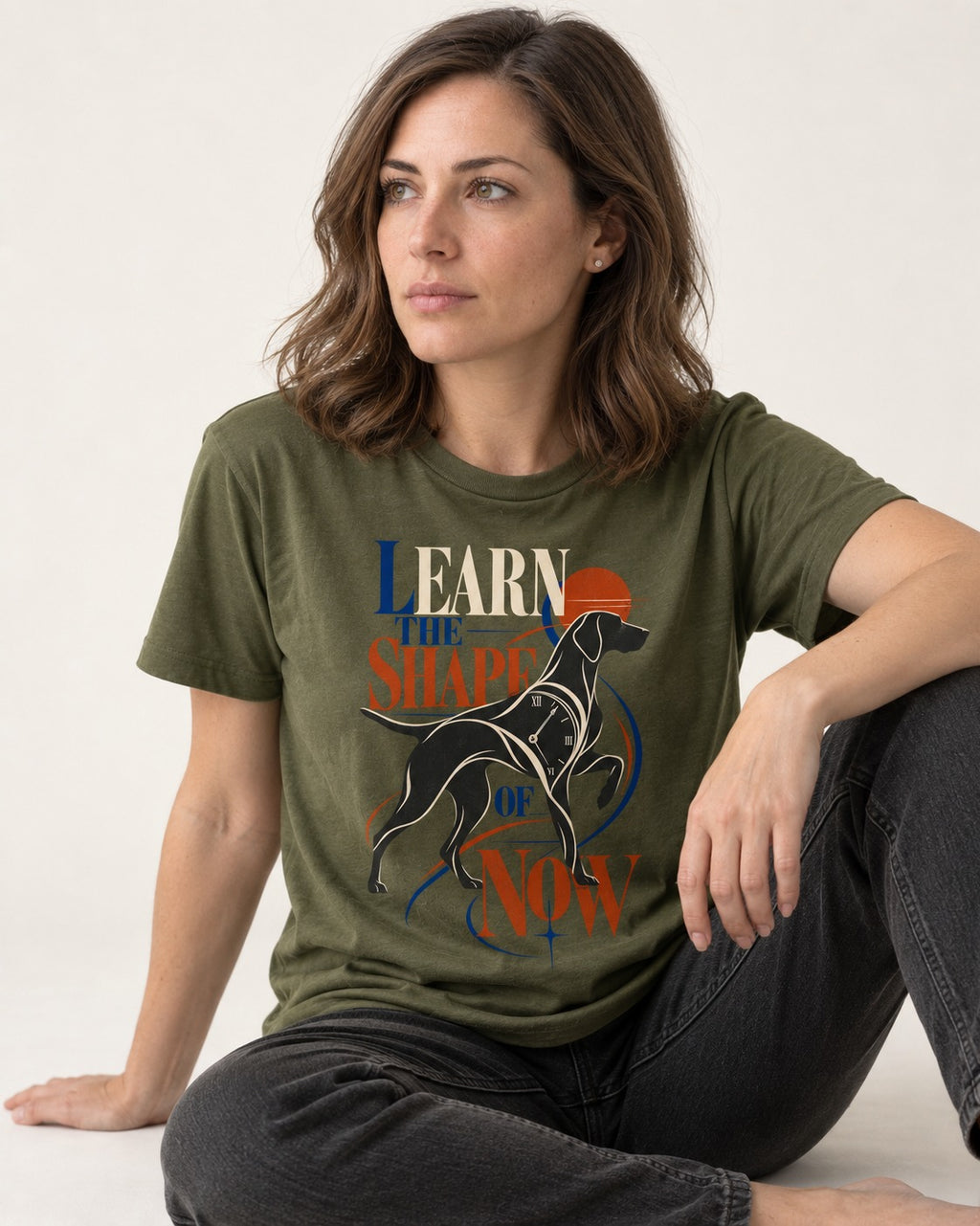 German Shorthaired Pointer Learn the Shape of Now Clock Graphic T-Shirt in Heather Military Green, worn by a seated model