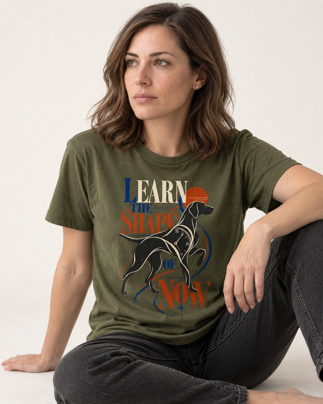 German Shorthaired Pointer Learn the Shape of Now Clock Graphic T-Shirt in Heather Military Green, worn by a seated model