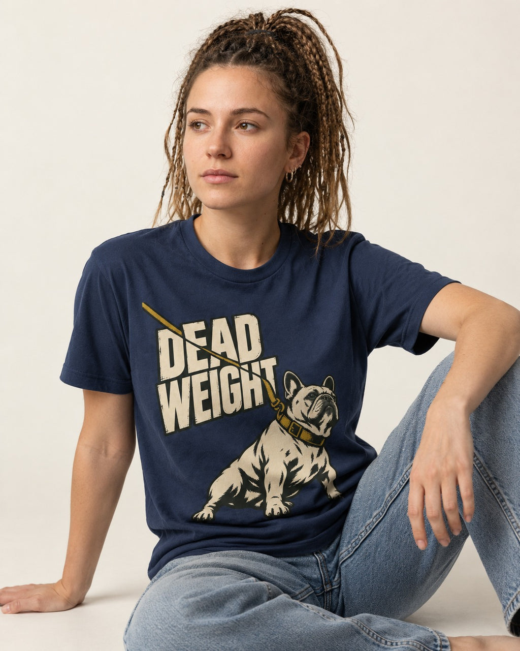 Frenchie Dead Weight Leash Graphic T-Shirt in Navy, worn by a seated model