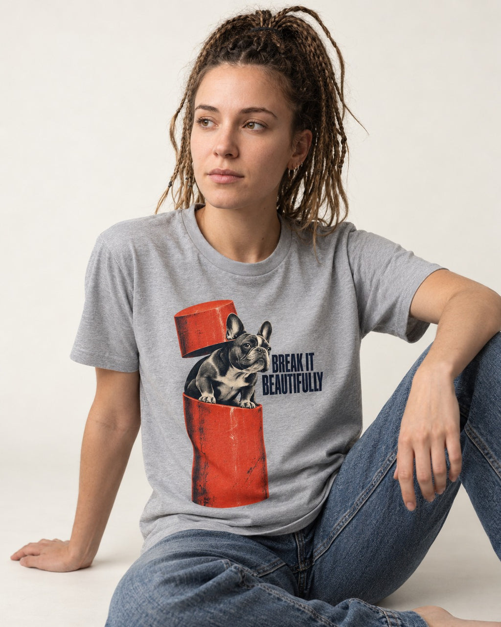 Frenchie Break It Beautifully T-Shirt in Sport Grey, worn by a seated model
