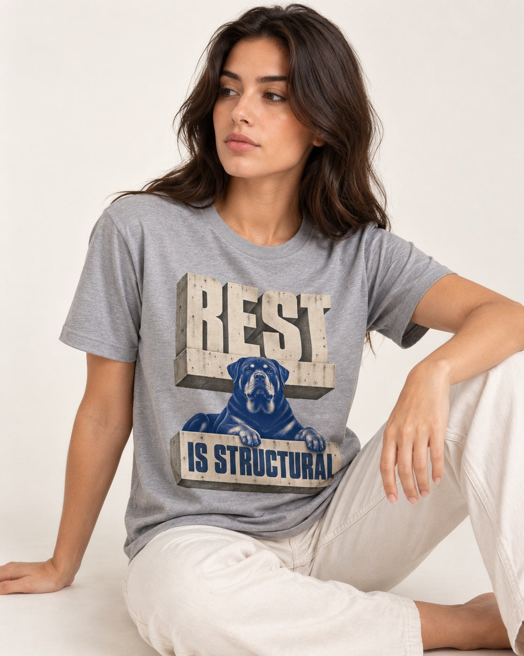 Rottweiler Rest Is Structural Architectural Type Graphic T-Shirt in Sport Grey, worn by a seated model