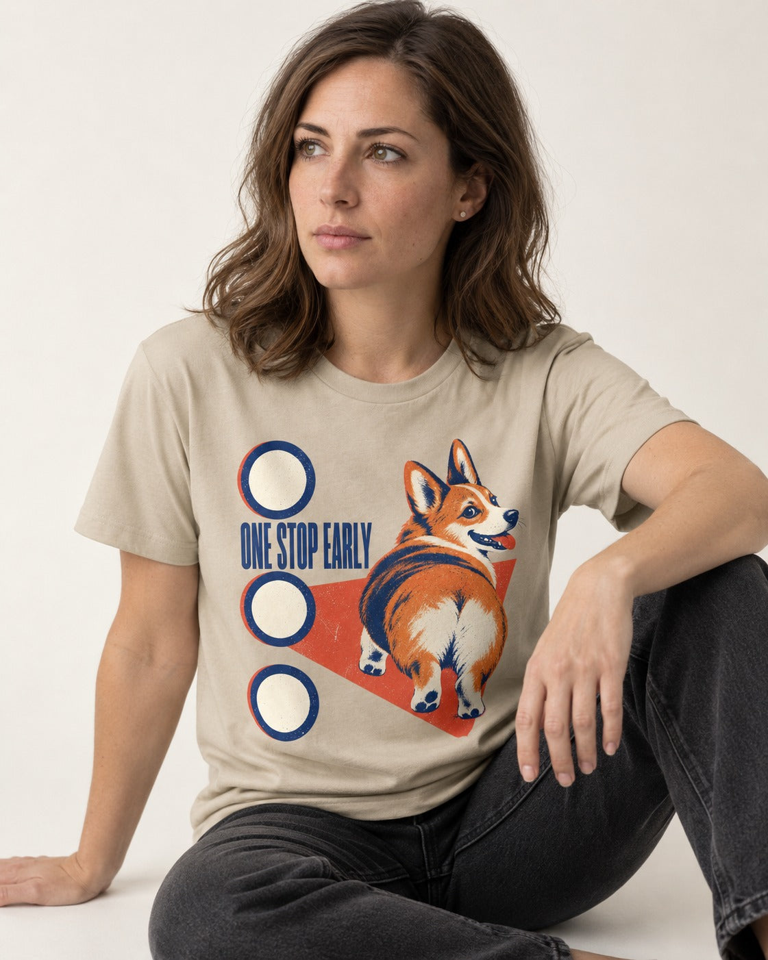 One Stop Early Corgi T-Shirt in Sand, worn by a seated model