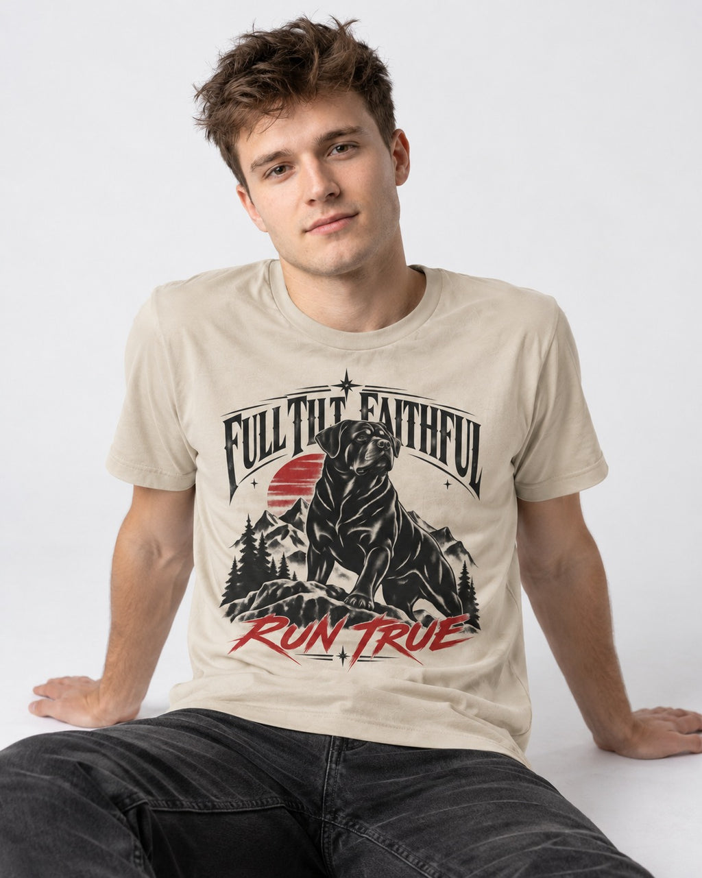 Run True Rottweiler T-Shirt in Sand, worn by a seated model