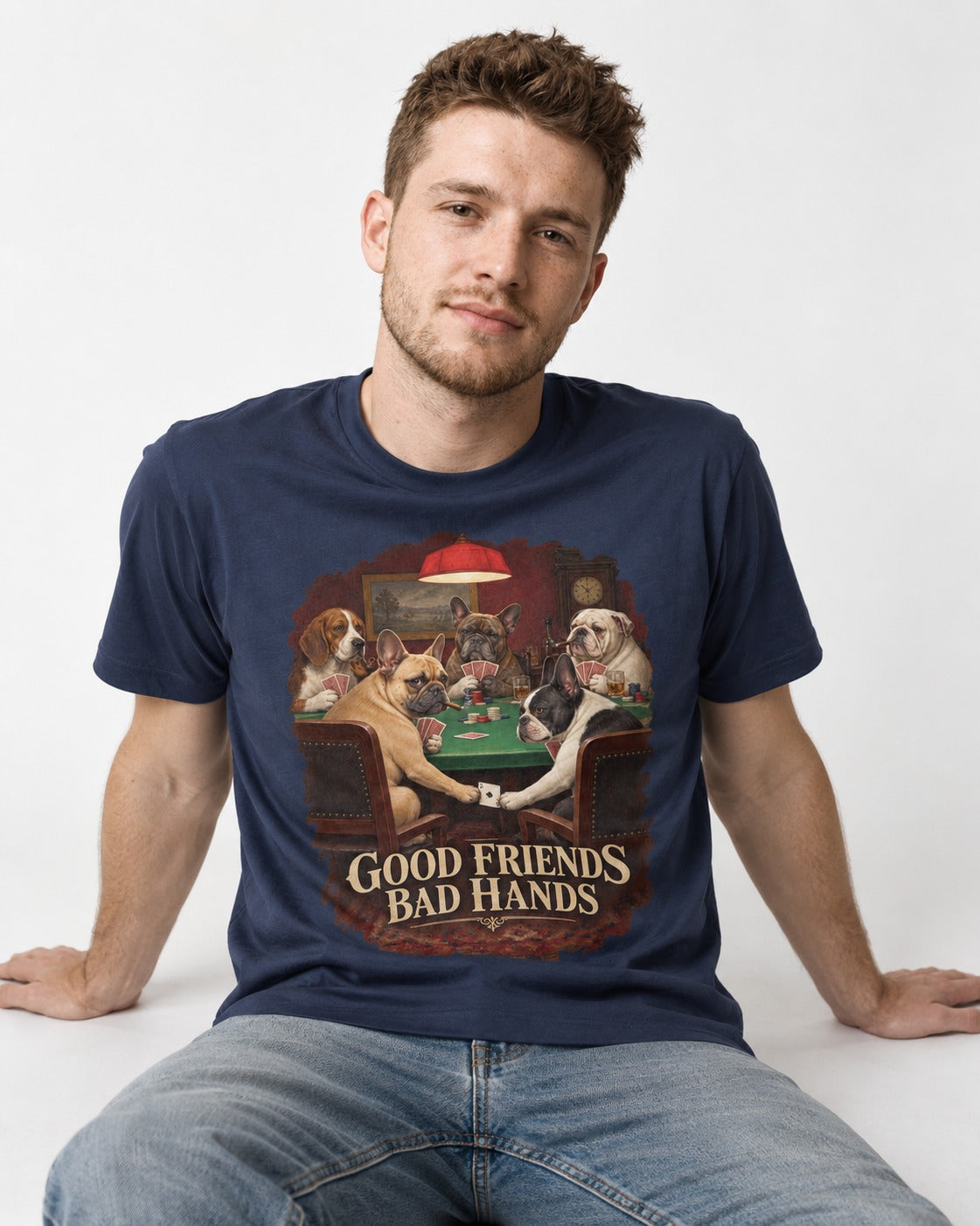 Frenchie Good Friends Bad Hands Poker Graphic T-Shirt in Navy, worn by a seated model