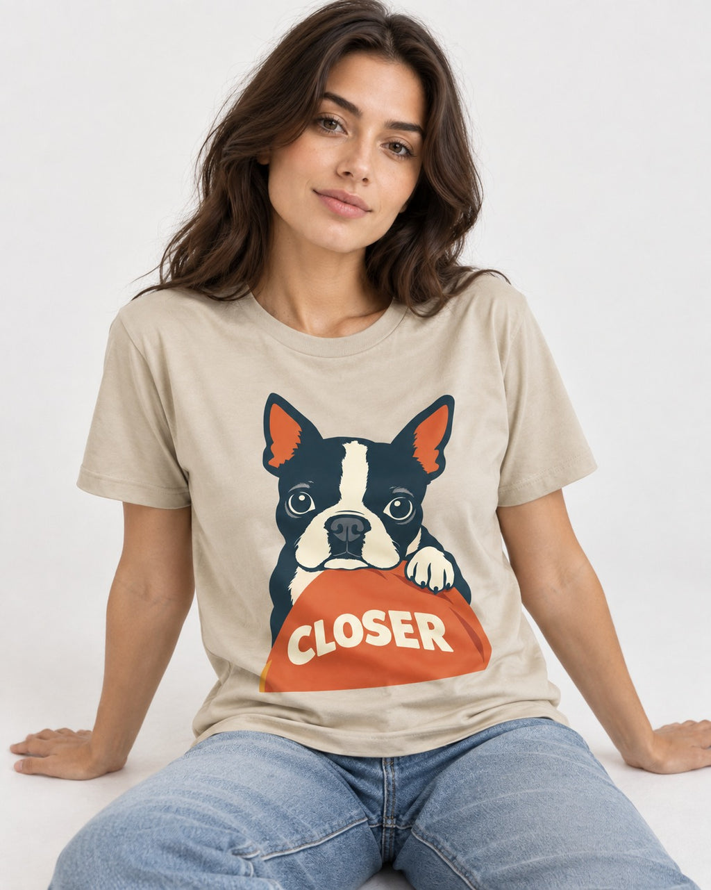 Come Closer Boston Terrier T-Shirt in Sand, worn by a seated model