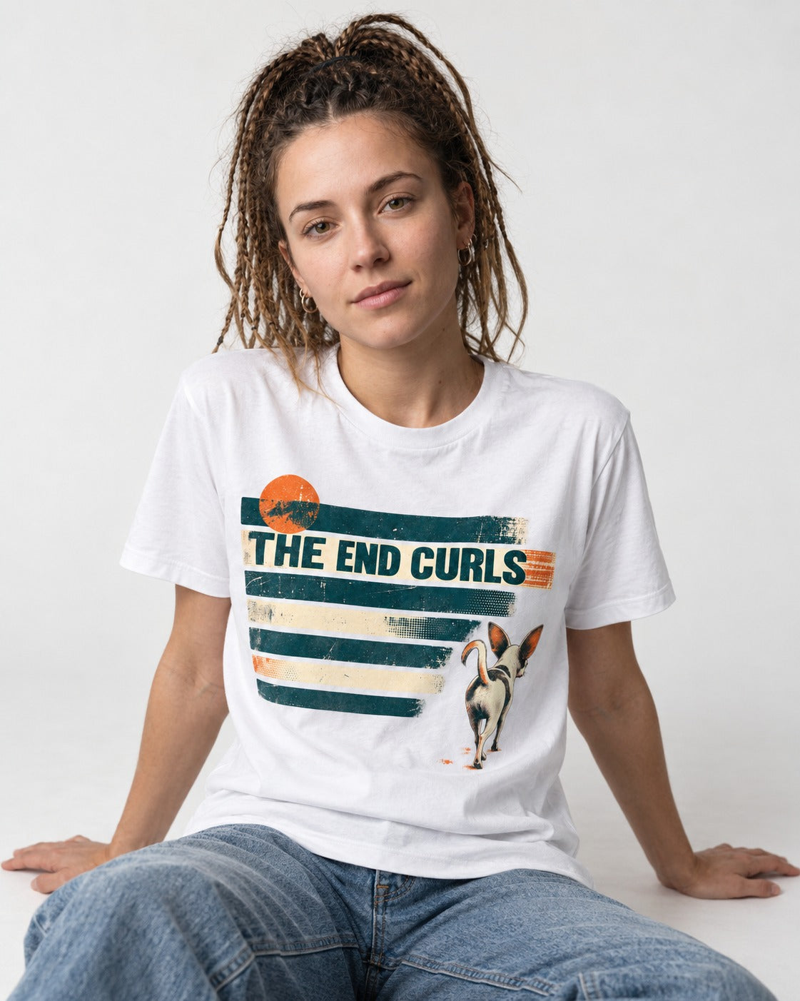 Chihuahua The End Curls Retro Stripe Graphic T-Shirt in White, worn by a seated model