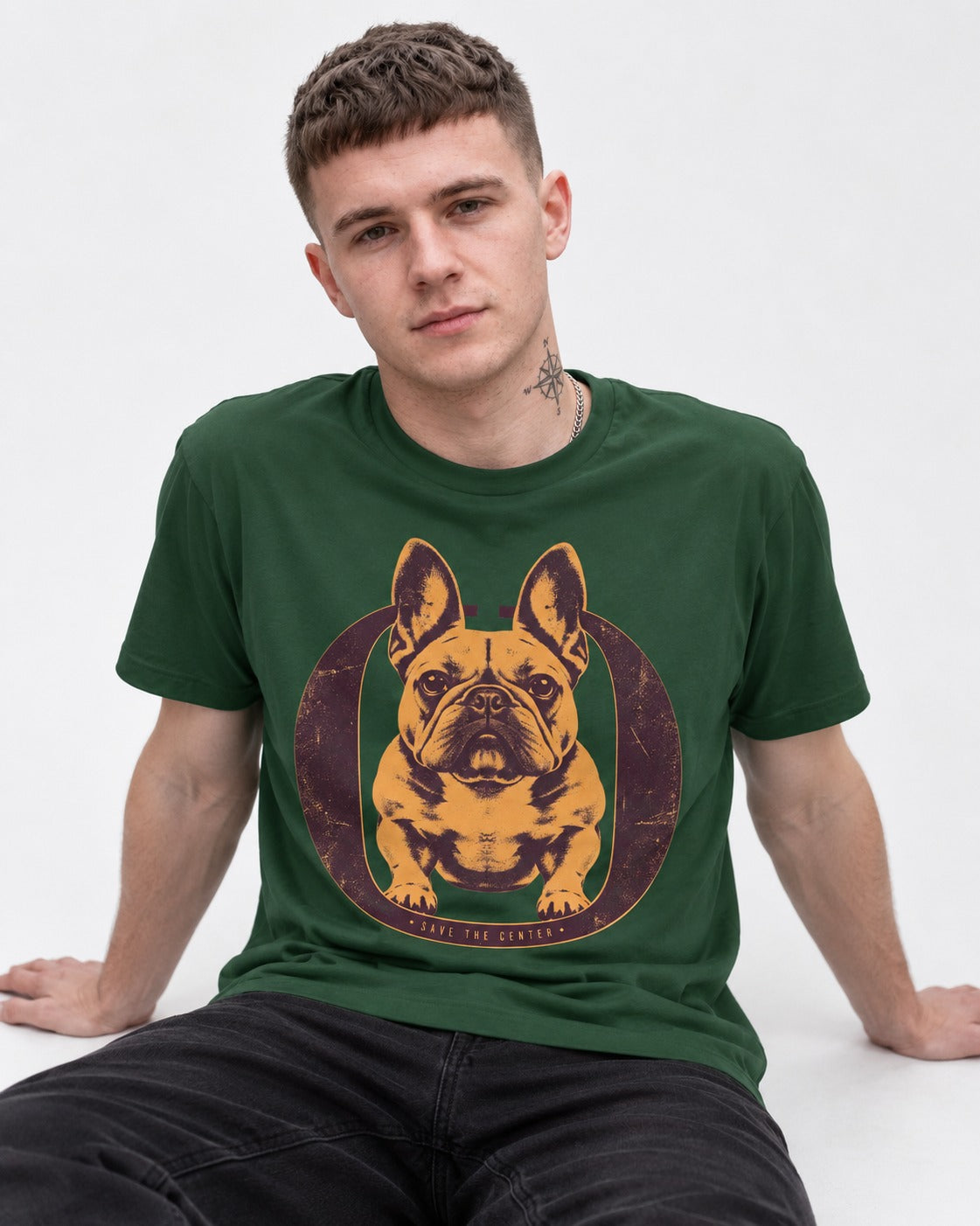 Frenchie Save the Center Oval Portrait Graphic T-Shirt in Forest Green, worn by a seated model