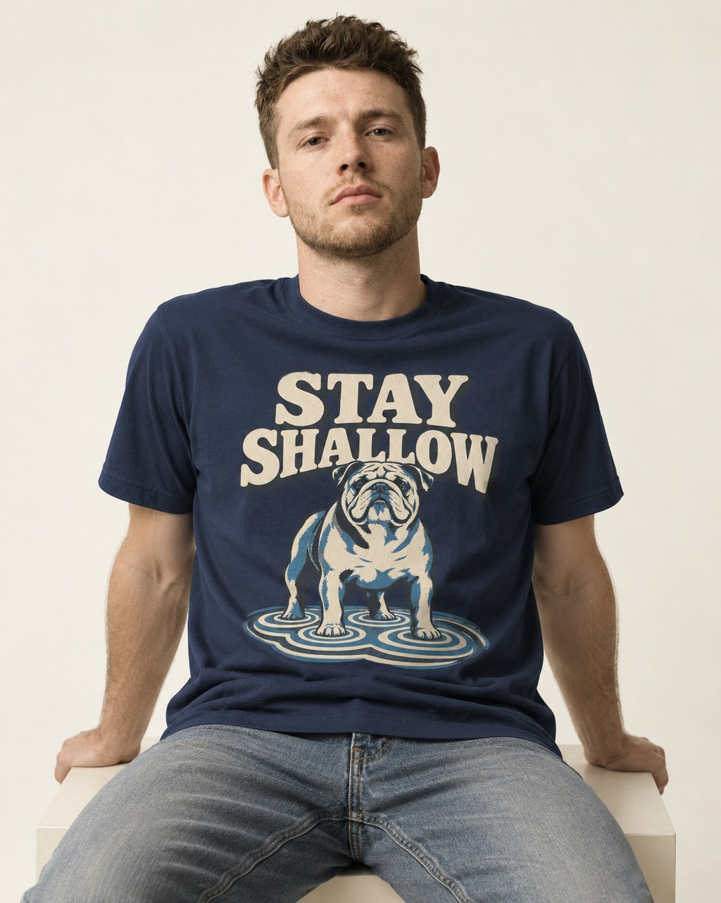 English Bulldog Stay Shallow Ripple Graphic T-Shirt in Navy, worn by a seated model
