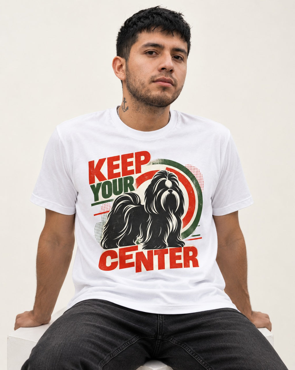 Shih Tzu Keep Your Center Retro Target Graphic T-Shirt in White, worn by a seated model