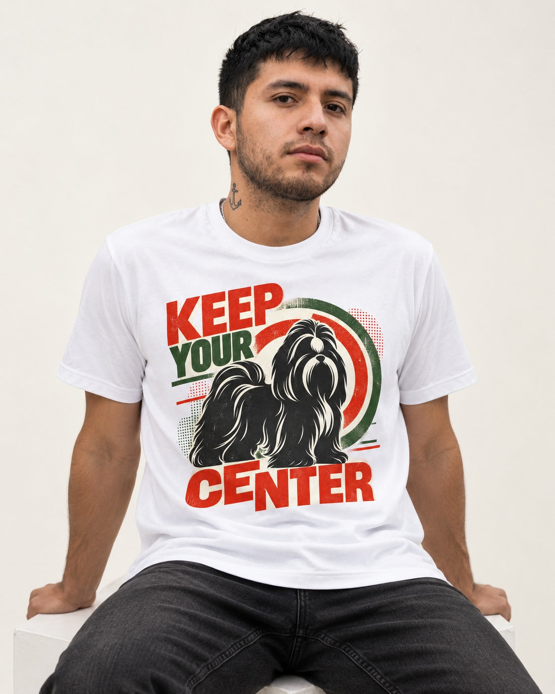 Shih Tzu Keep Your Center Retro Target Graphic T-Shirt in White, worn by a seated model