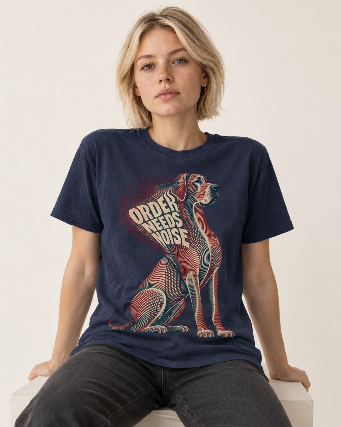 Great Dane Order Needs Noise Optical Line Graphic T-Shirt in Navy, worn by a seated model