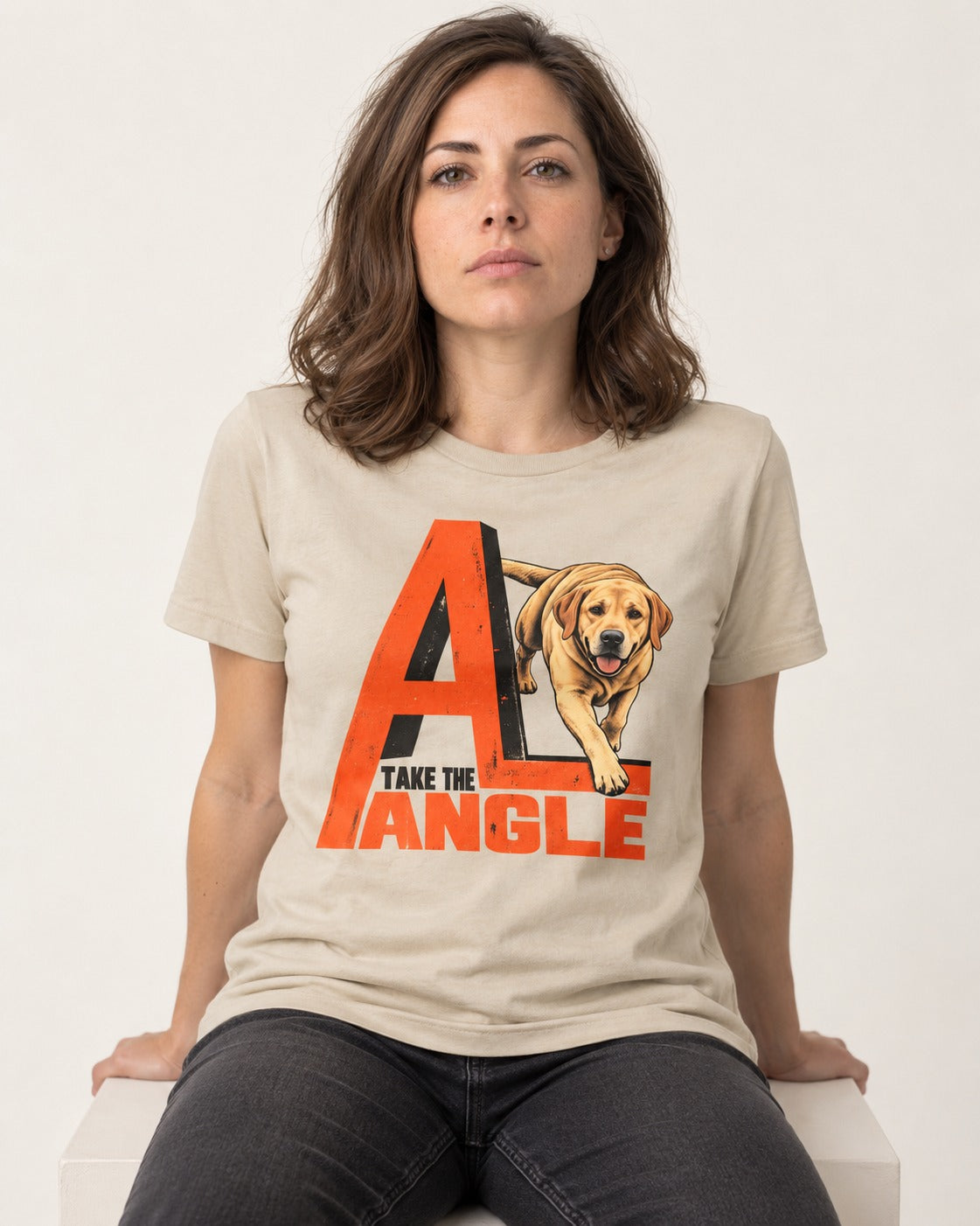 Take the Angle Labrador Retriever T-Shirt in Sand, worn by a seated model