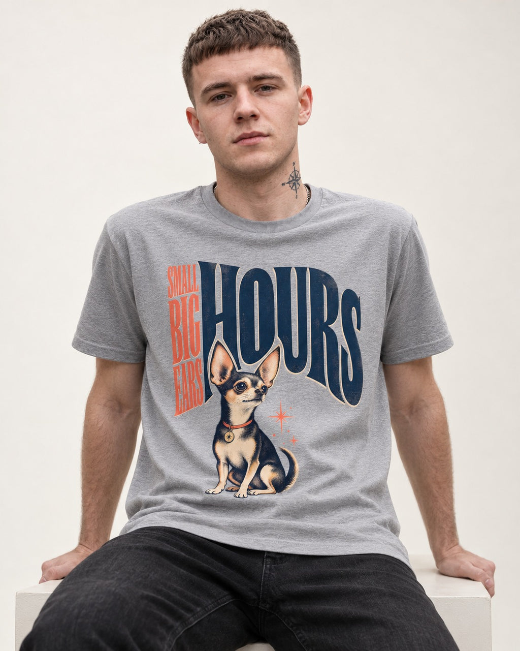 Chihuahua Small Big Ears Hours T-Shirt in Sport Grey, worn by a seated model