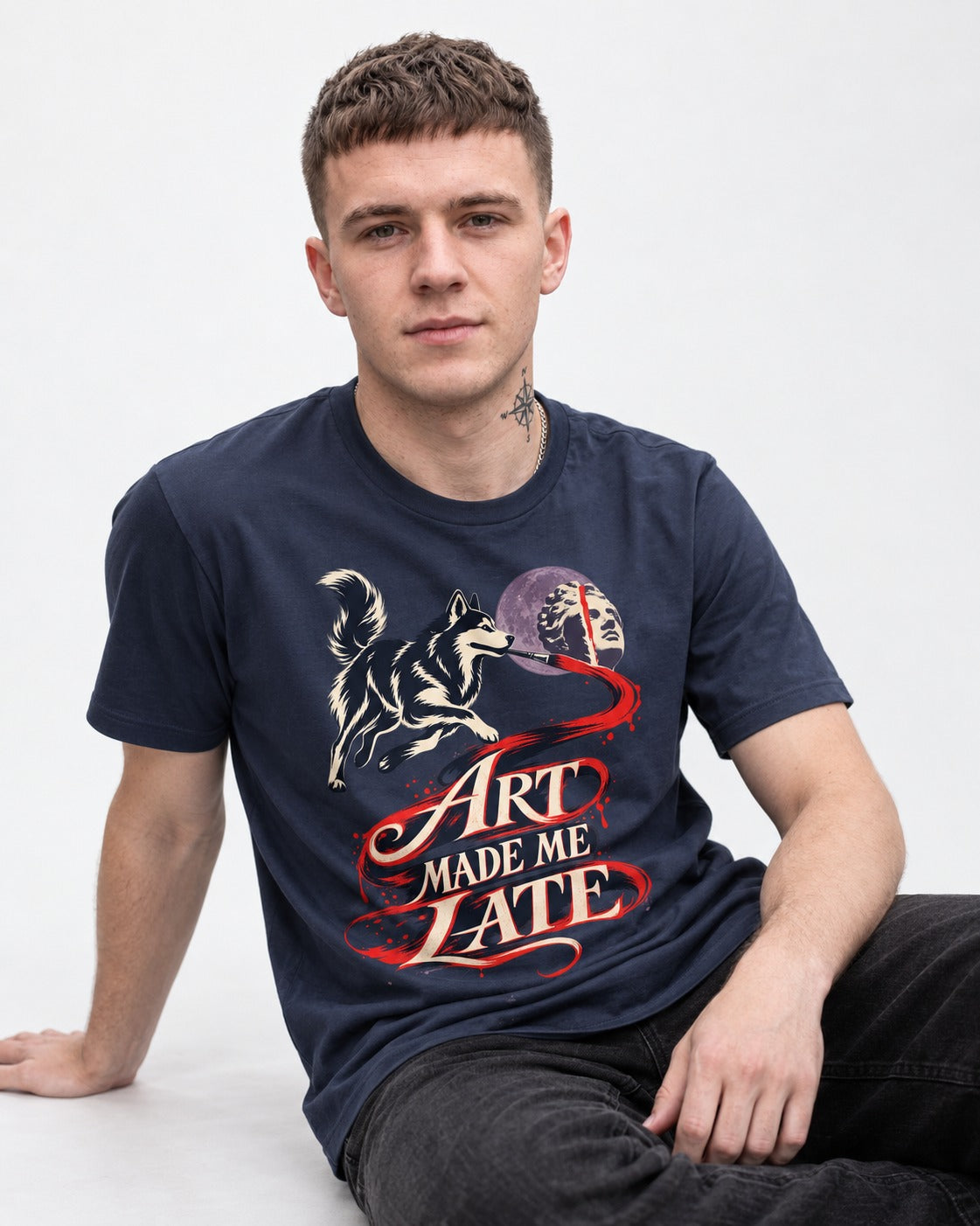 Husky Art Made Me Late Paintbrush Graphic T-Shirt in Navy, worn by a seated model