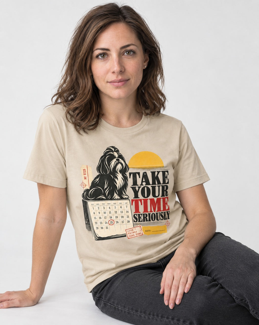 Take Your Time Seriously Shih Tzu T-Shirt in Sand, worn by a seated model