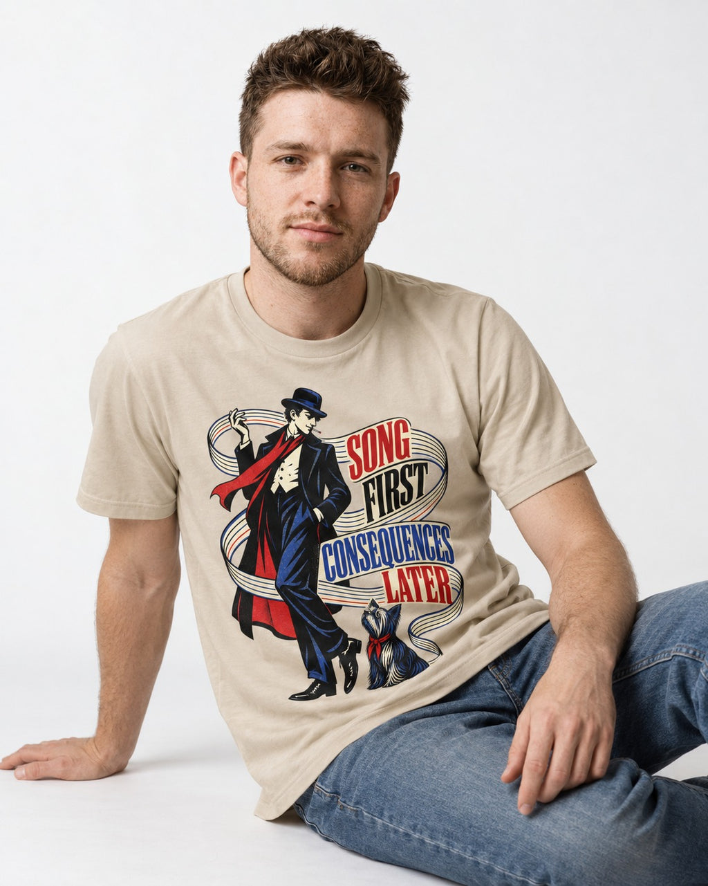 Yorkshire Terrier Song First Consequences Later T-Shirt in Sand, worn by a seated model