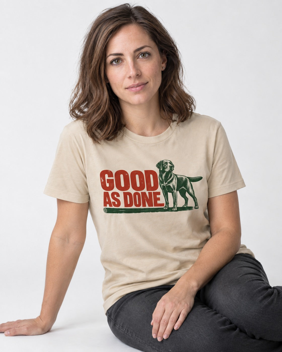 Good as Done Labrador Retriever T-Shirt in Sand, worn by a seated model