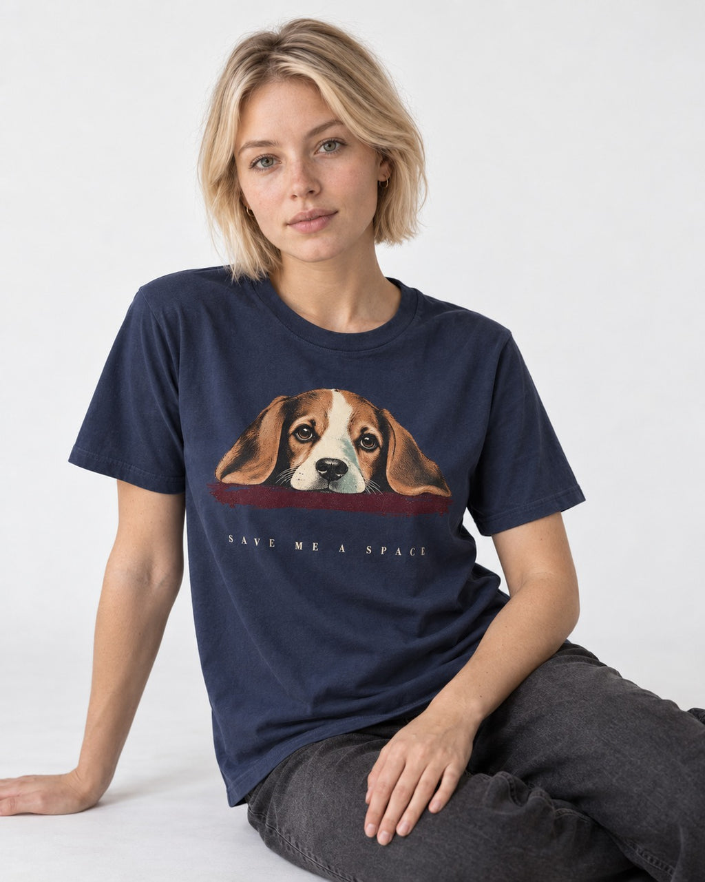 Save Me A Space Beagle T-Shirt in Navy, worn by a seated model