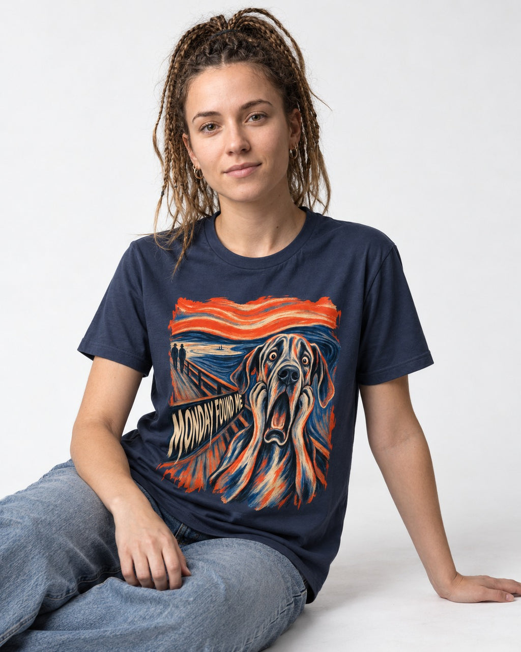 Great Dane Monday Found Me Scream Parody Graphic T-Shirt in Navy, worn by a seated model