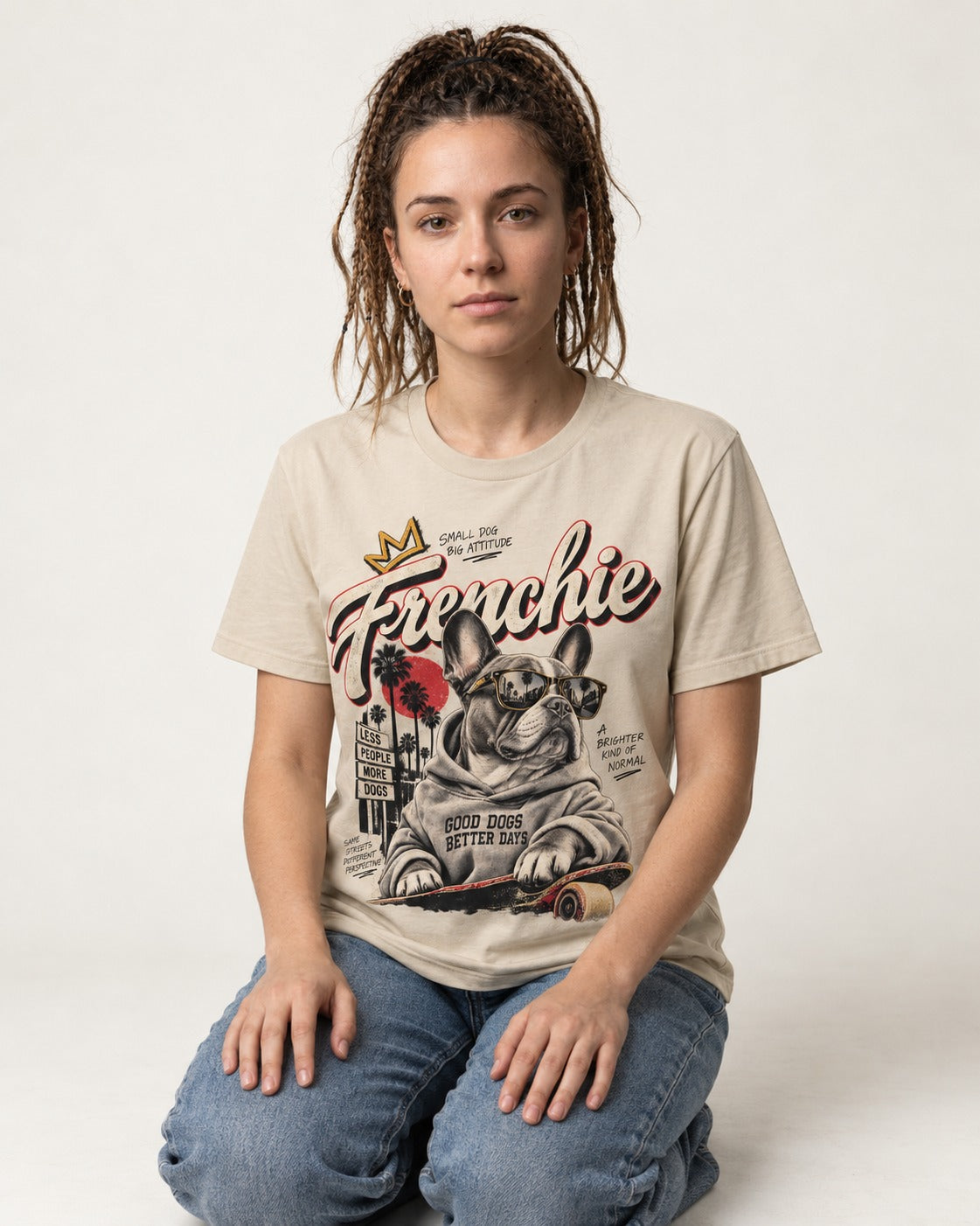 Frenchie Better Days T-Shirt in Sand, worn by a seated model