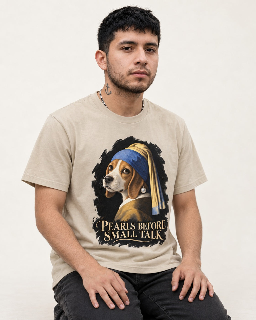Beagle Paris Before Small Talk T-Shirt in Sand, worn by a seated model