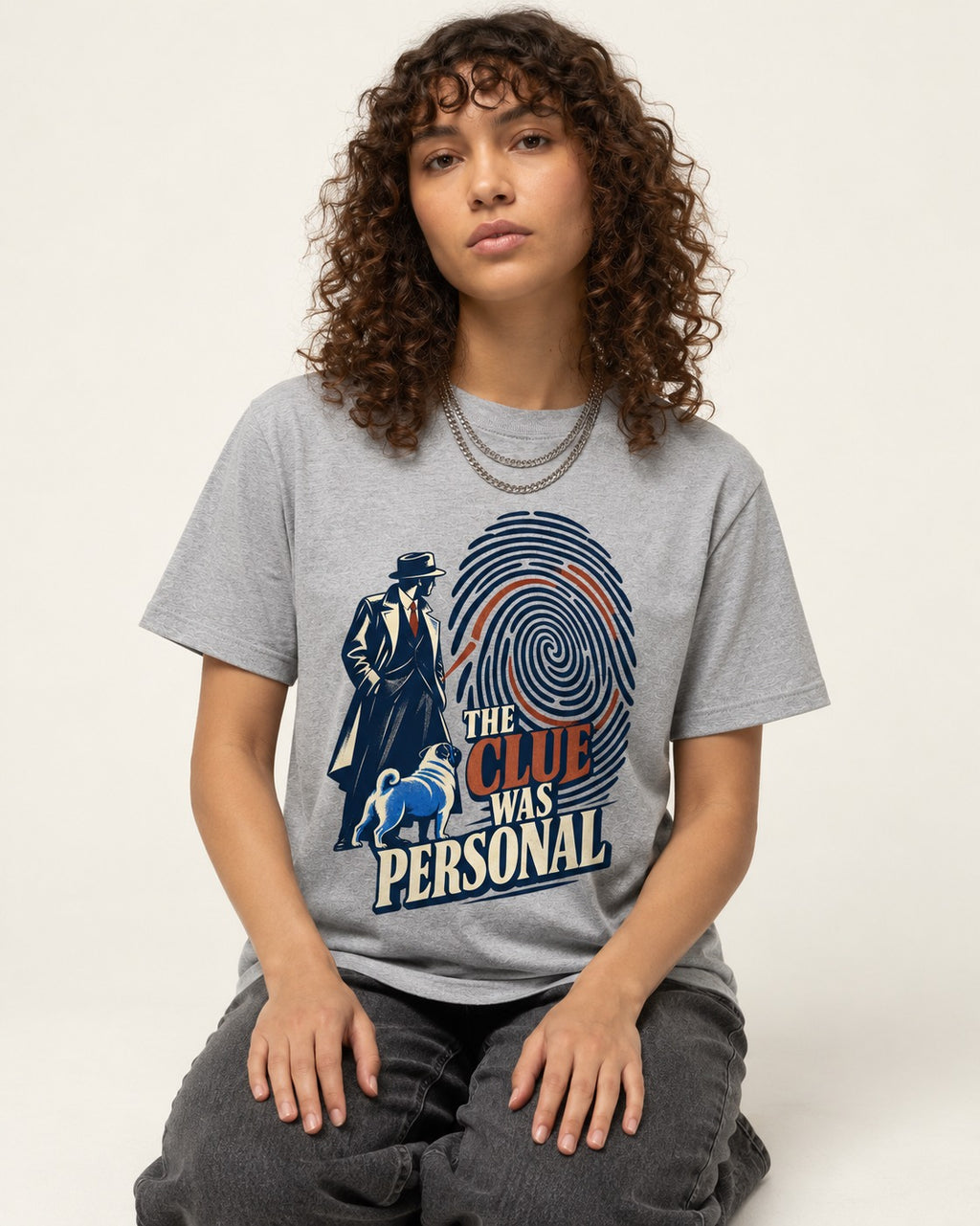 The Pug Clue Was Personal T-Shirt in Sport Grey, worn by a seated model