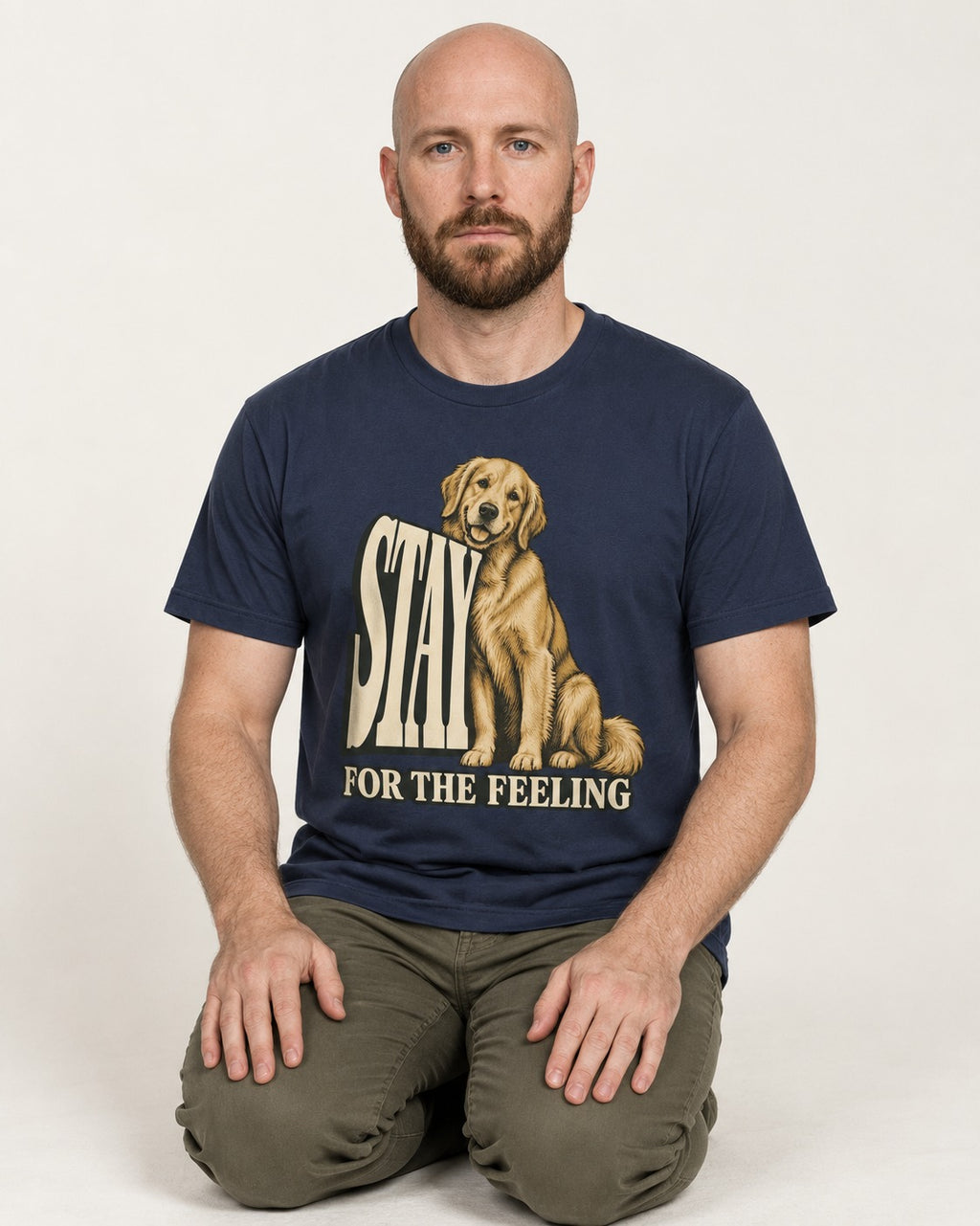 Golden Retriever Stay for the Feeling Leaning Puppy Graphic T-Shirt in Navy, worn by a seated model