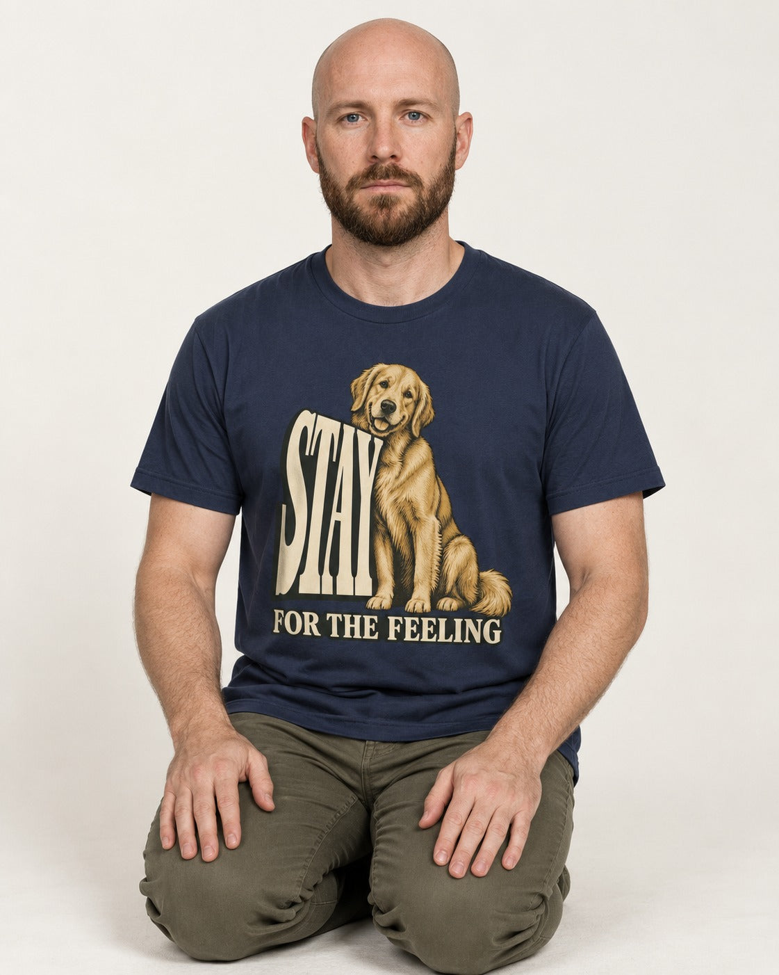 Golden Retriever Stay for the Feeling Leaning Puppy Graphic T-Shirt in Navy, worn by a seated model