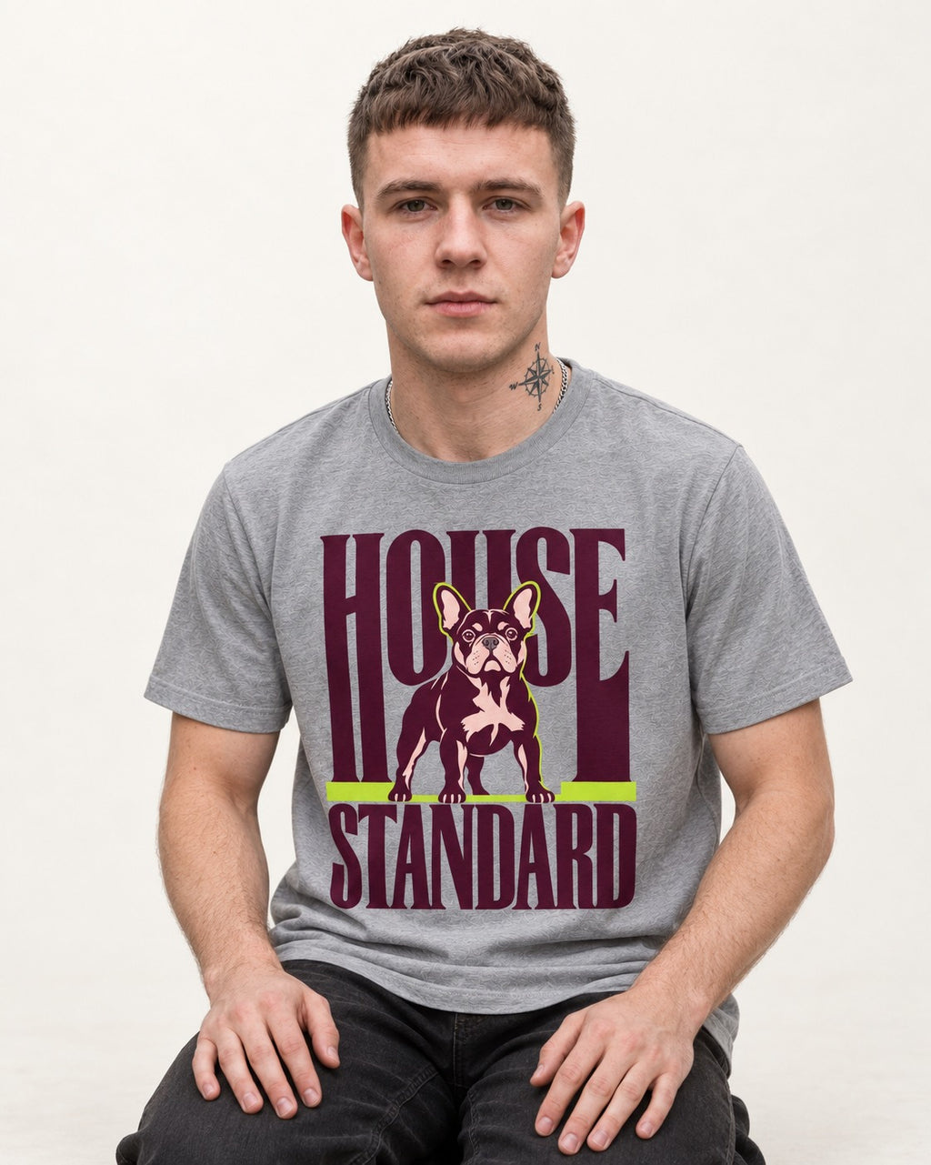 Frenchie House Standard T-Shirt in Sport Grey, worn by a seated model