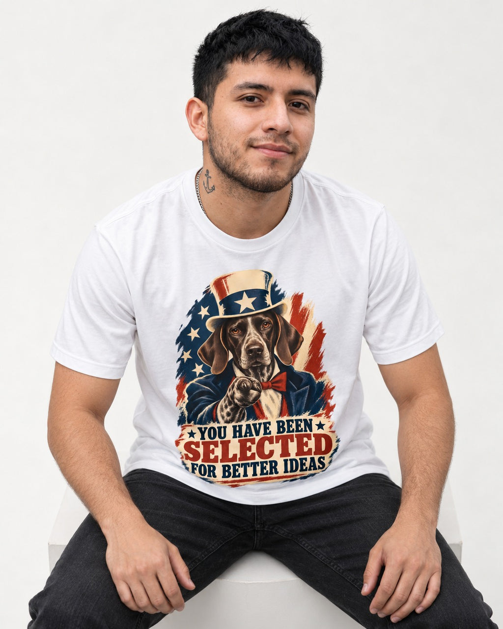 German Shorthaired Pointer You Have Been Selected For Better Ideas Uncle Sam Graphic T-Shirt in White, worn by a seated model