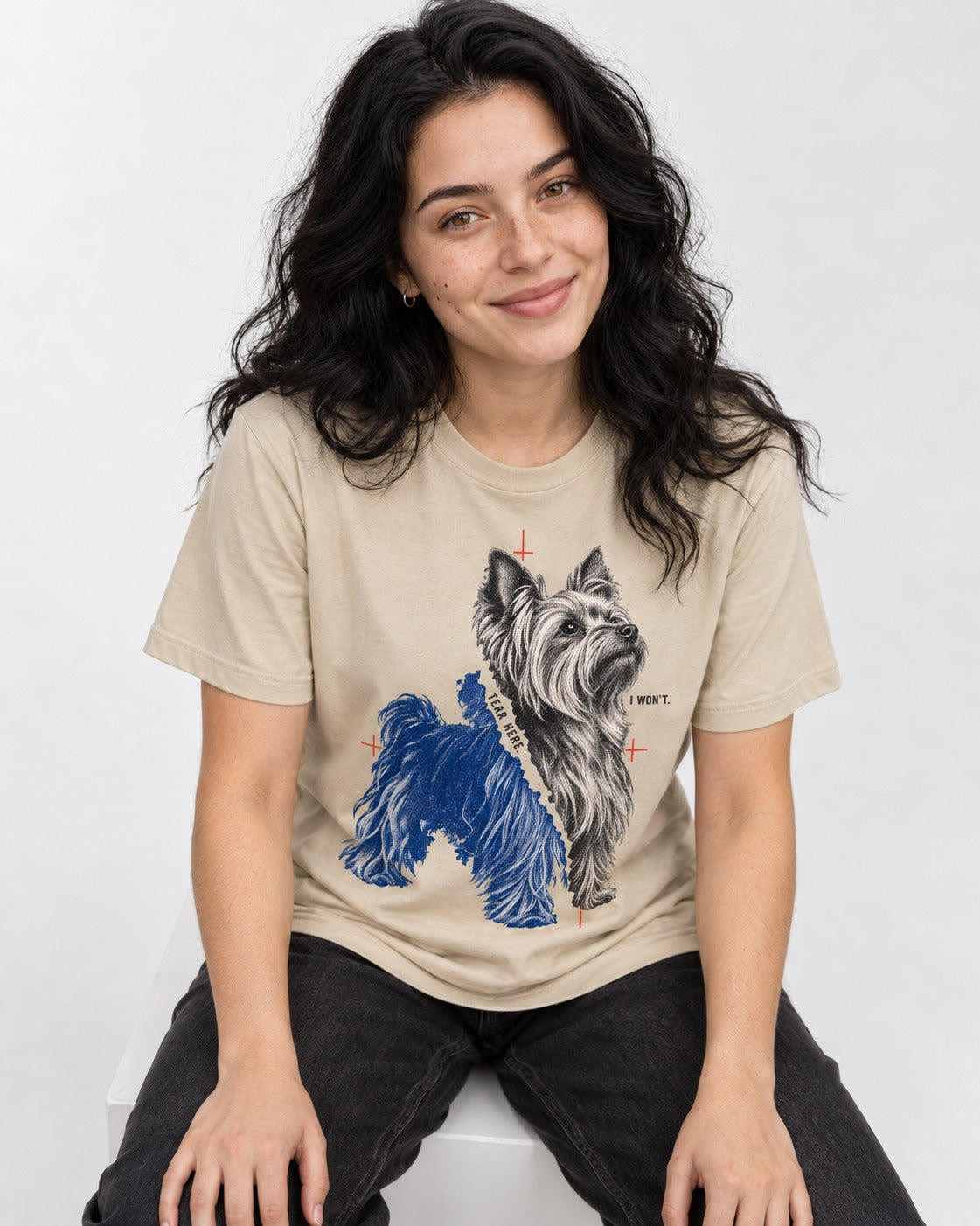 Yorkshire Terrier I Won't Tear Here T-Shirt in Sand, worn by a seated model
