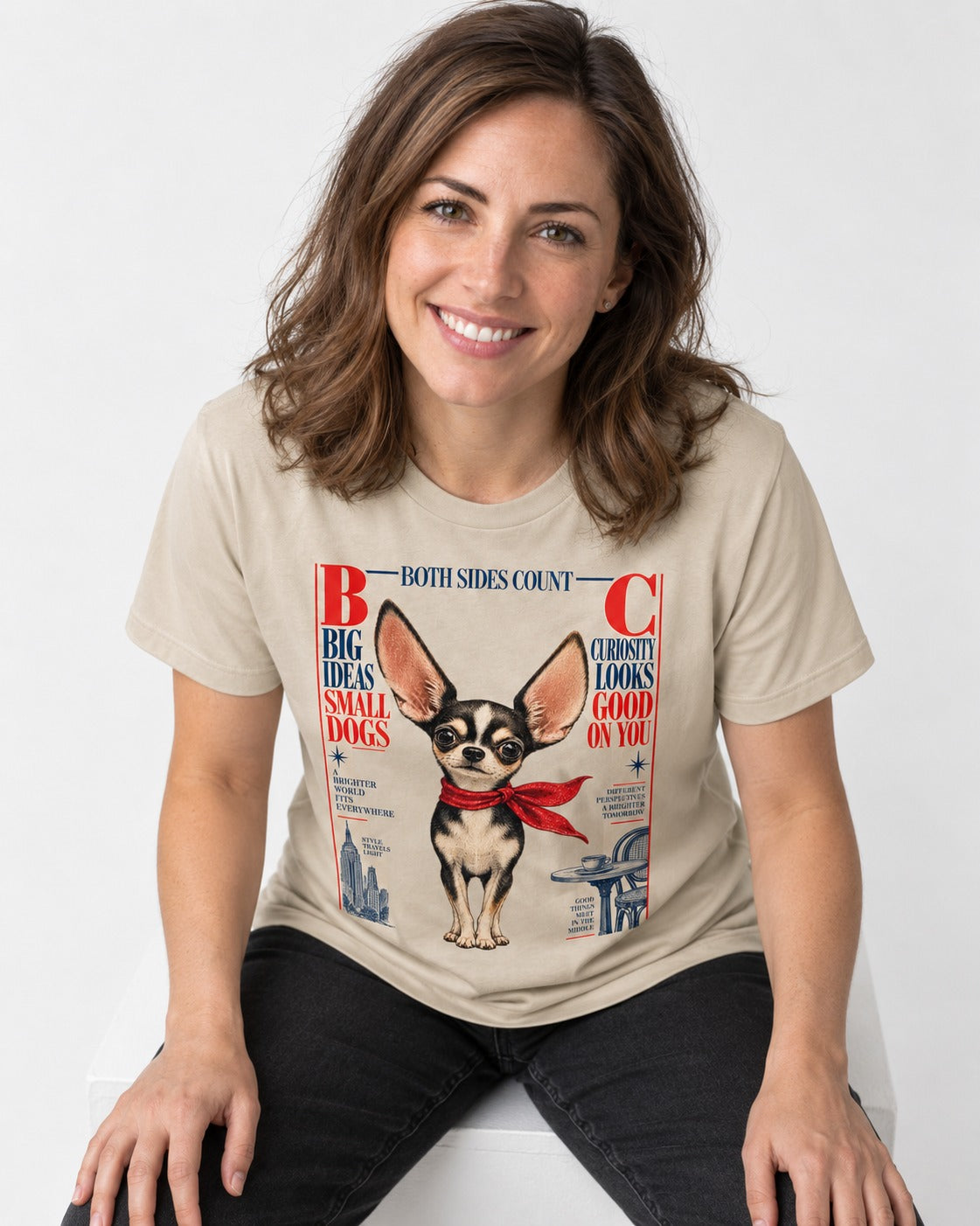 Chihuahua Big Ideas T-Shirt in Sand, worn by a seated model
