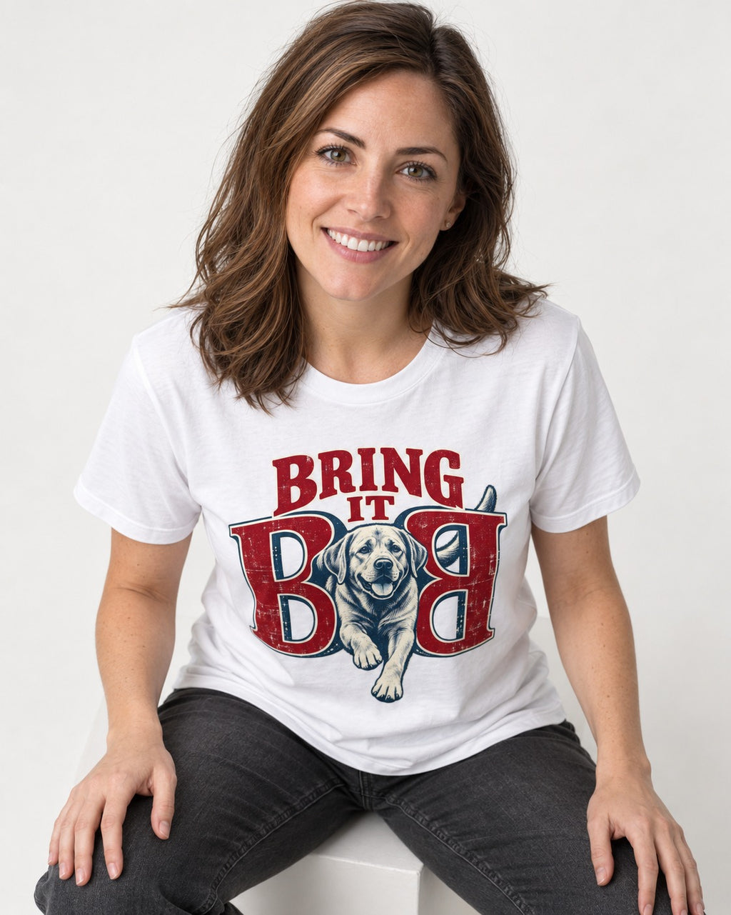 Labrador Retriever Bring It Opposing B Portrait Graphic T-Shirt in White, worn by a seated model