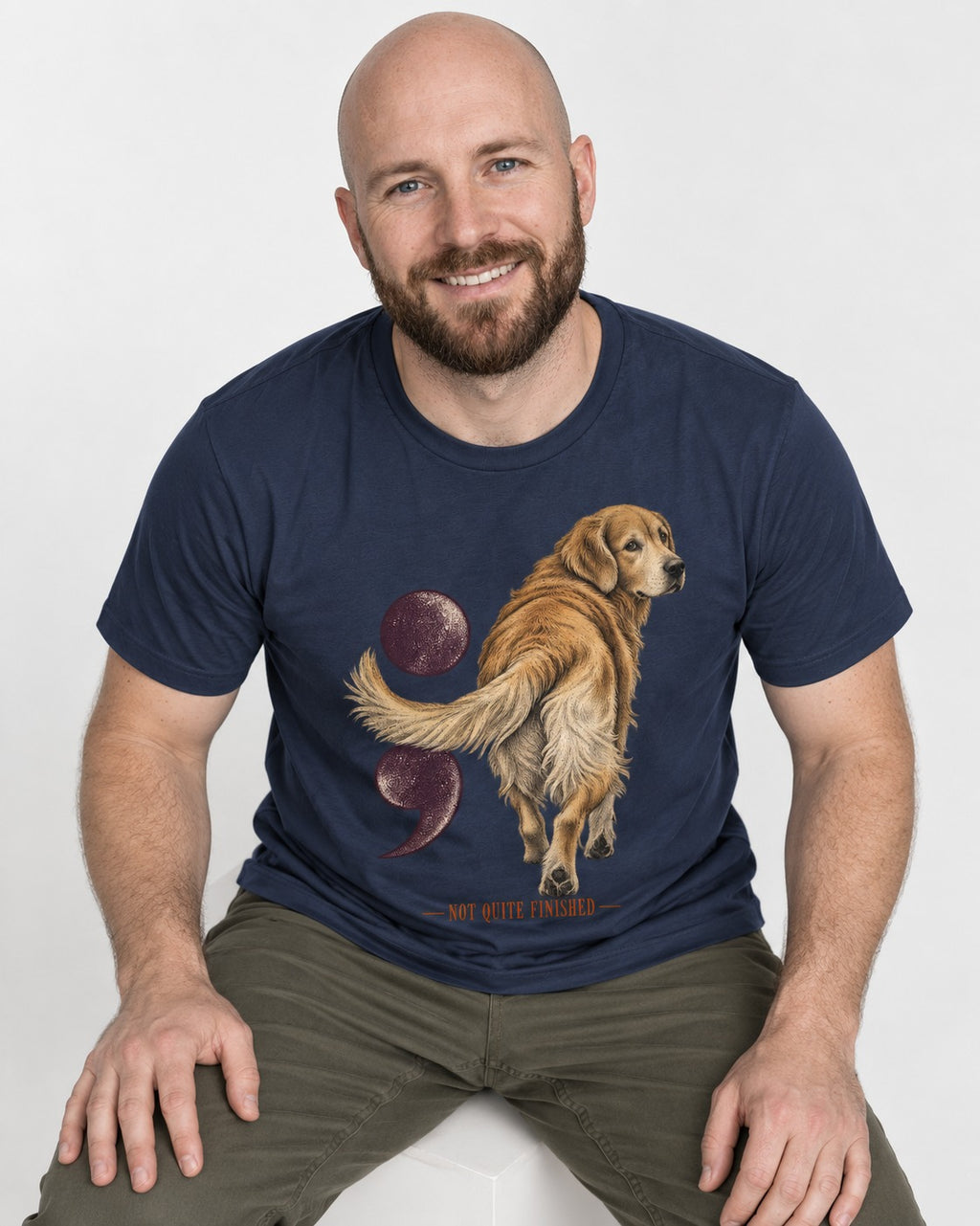 Golden Retriever Not Quite Finished Semicolon Graphic T-Shirt in Navy, worn by a seated model
