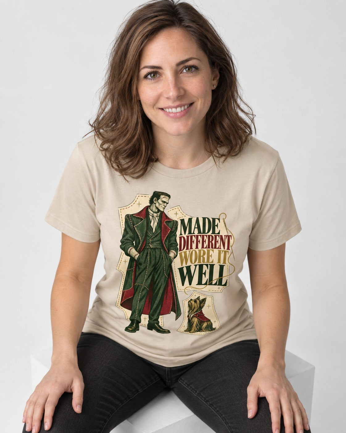 Yorkshire Terrier Made Different T-Shirt in Sand, worn by a seated model