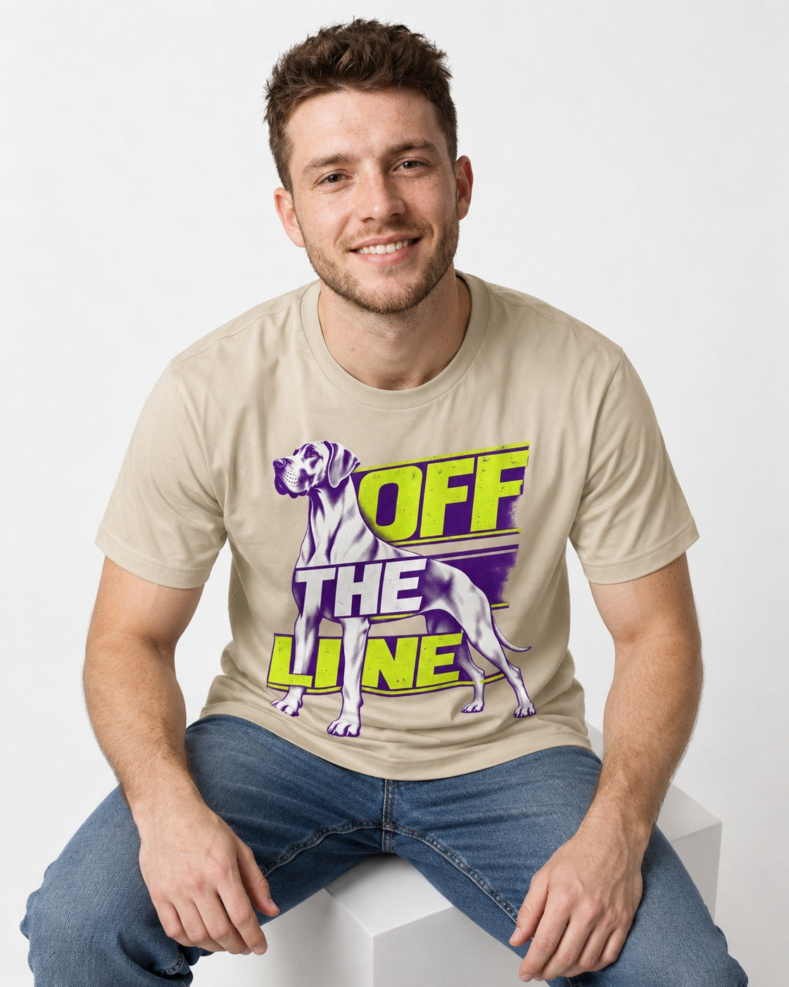 Great Dane Off the Line T-Shirt in Sand, worn by a seated model