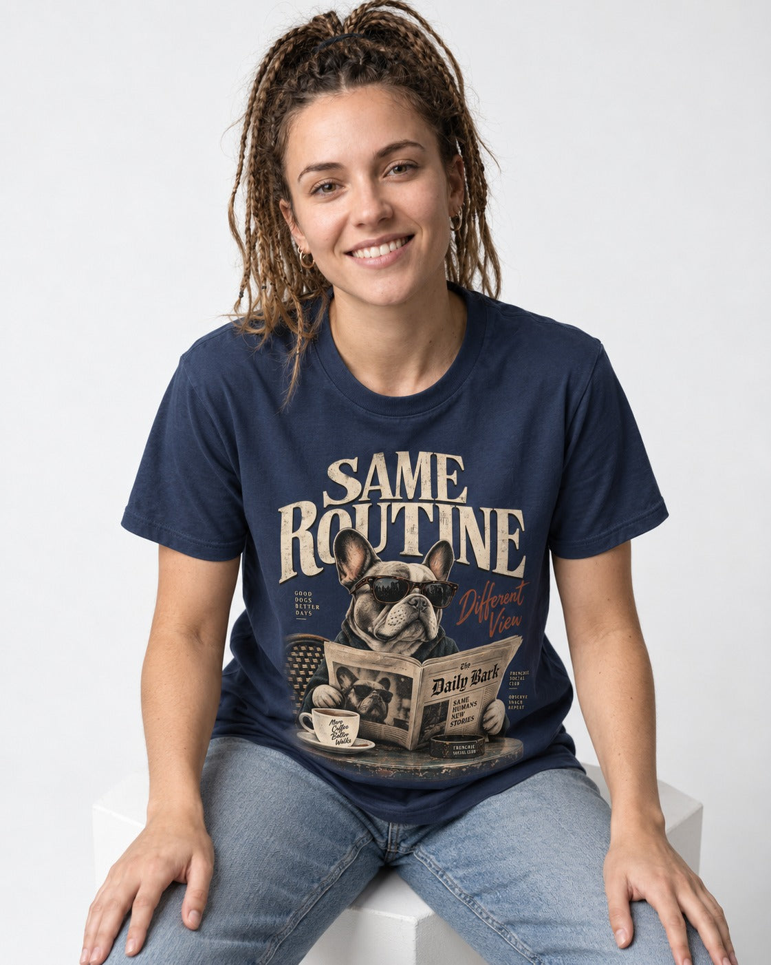 Frenchie Same Routine Different View Graphic T-Shirt in Navy, worn by a seated model