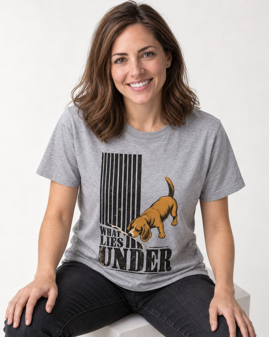 Beagle Knows What Lies Under T-Shirt in Sport Grey, worn by a seated model