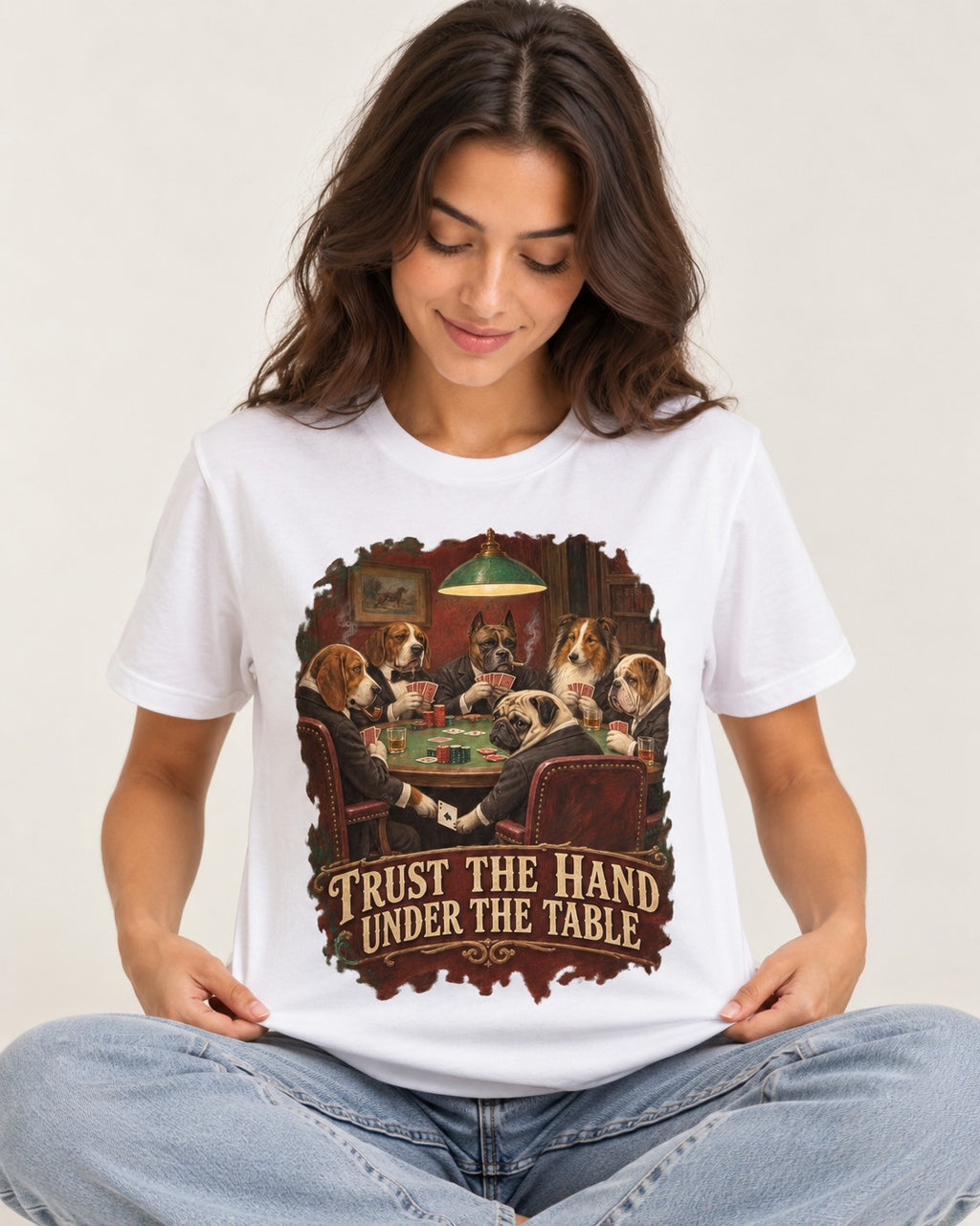Pug Trust the Hand Under the Table Poker Graphic T-Shirt in White, worn by a seated model