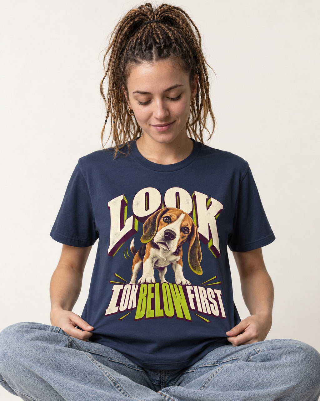 Beagle Look Low Below First T-Shirt in Navy, worn by a seated model
