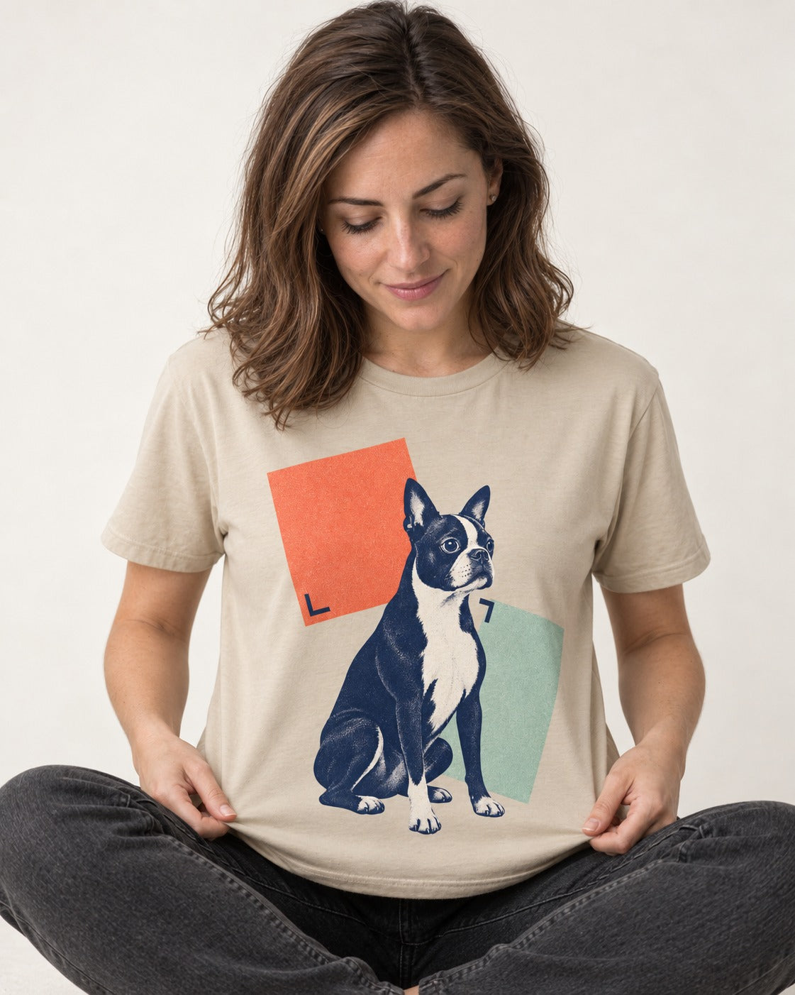 Boston Terrier Quiet Confidence T-Shirt in Sand, worn by a seated model