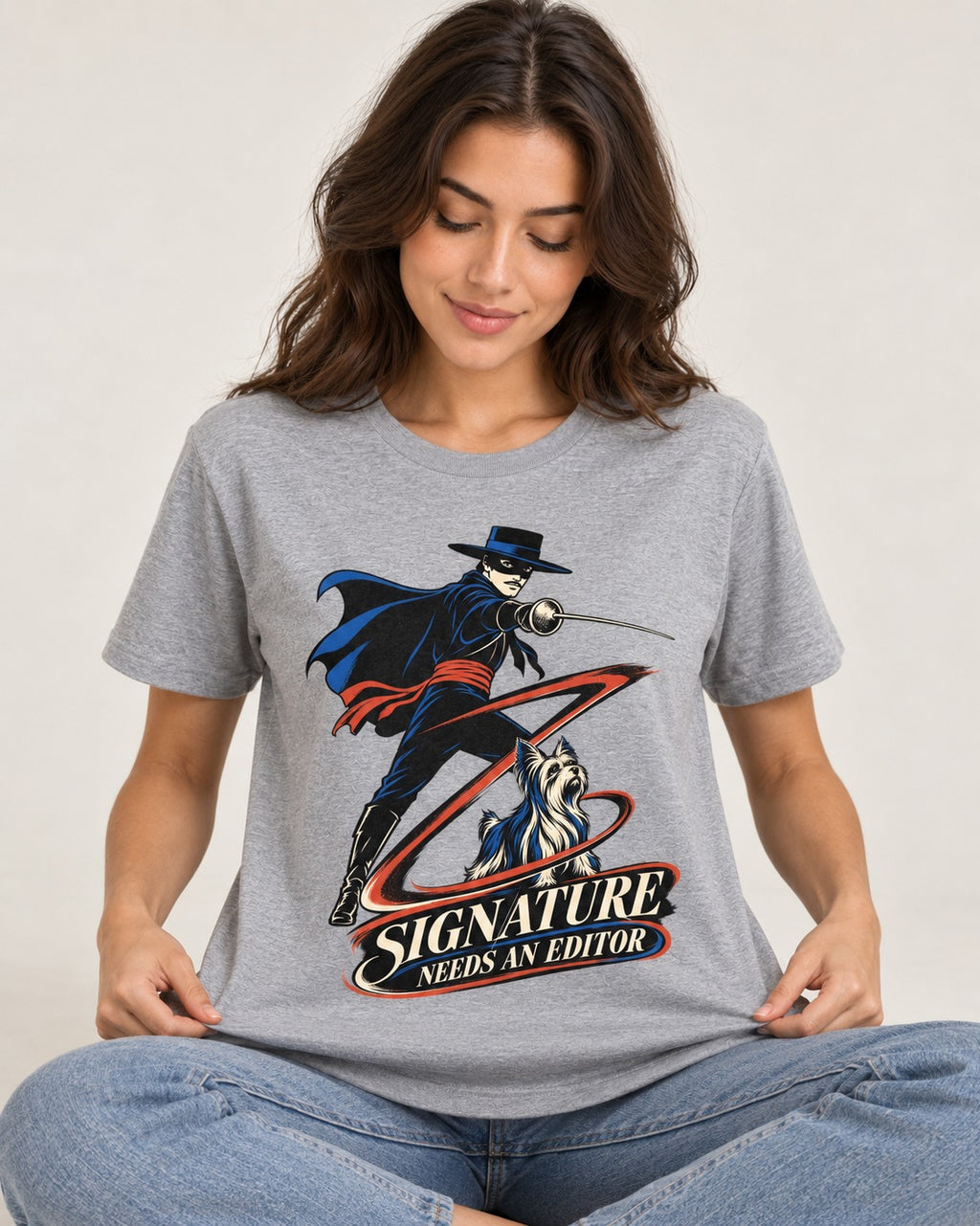 Yorkshire Terrier Signature Needs an Editor T-Shirt in Sport Grey, worn by a seated model