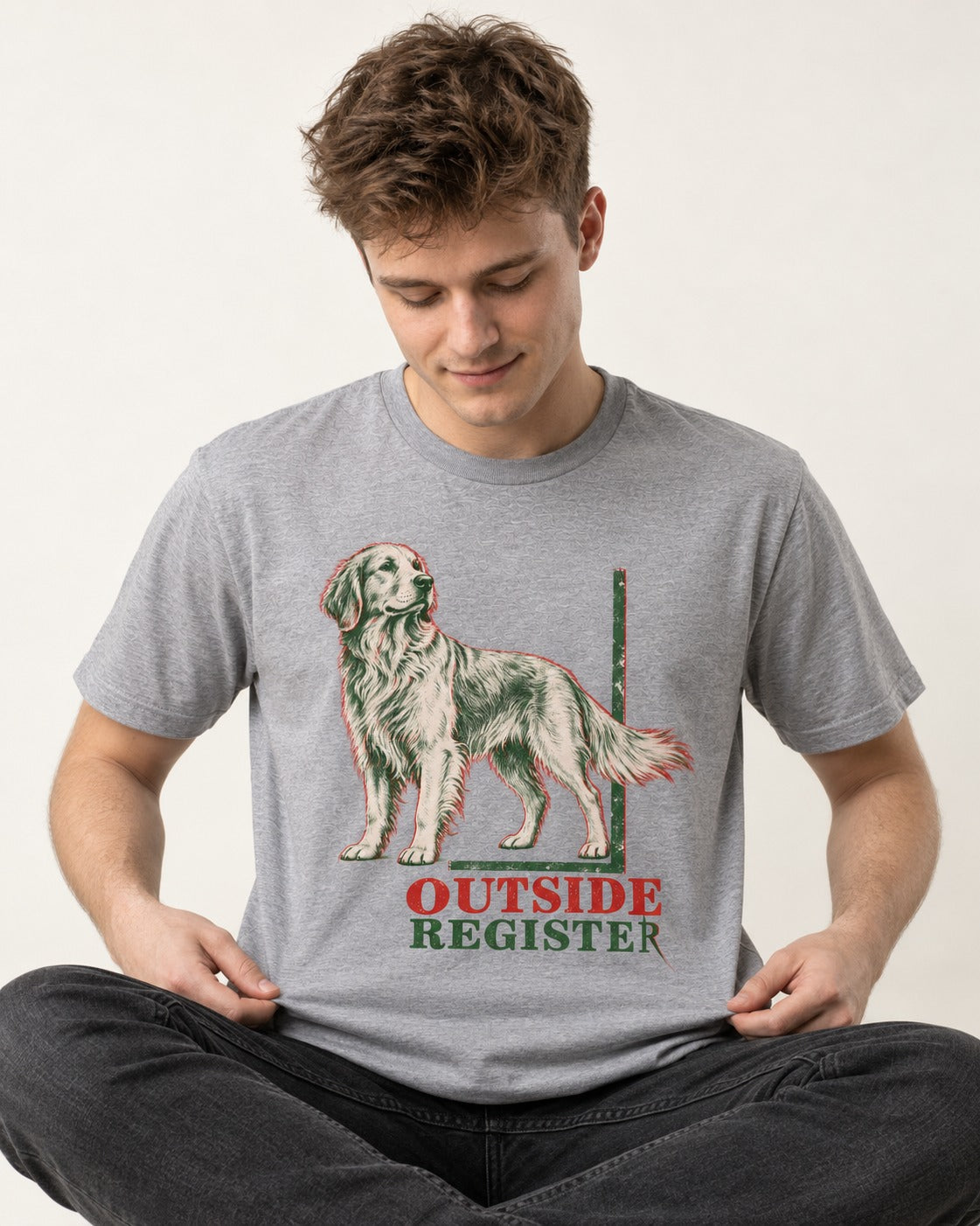 Outside Register Golden Retriever T-Shirt in Sport Grey, worn by a seated model