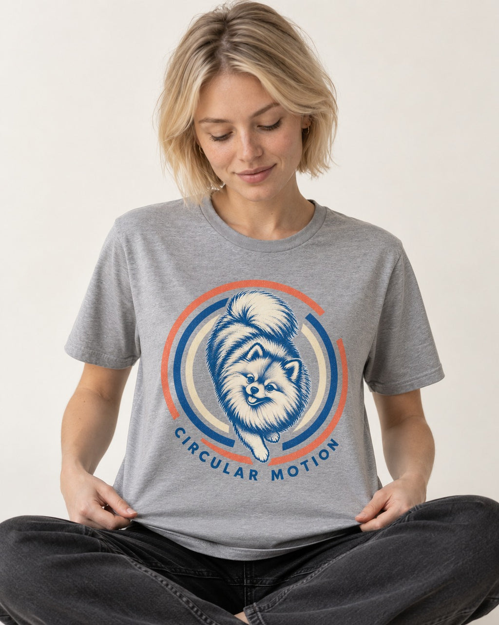 Pomeranian Circular Motion T-Shirt in Sport Grey, worn by a seated model