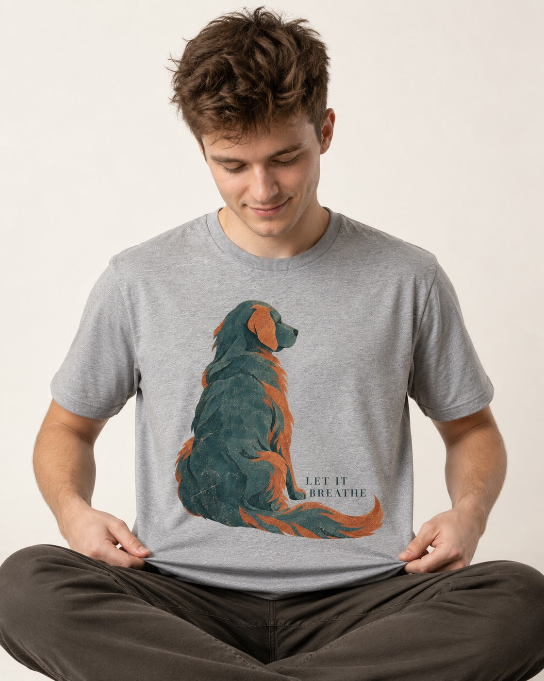 Let It Breathe Golden Retriever T-Shirt in Sport Grey, worn by a seated model