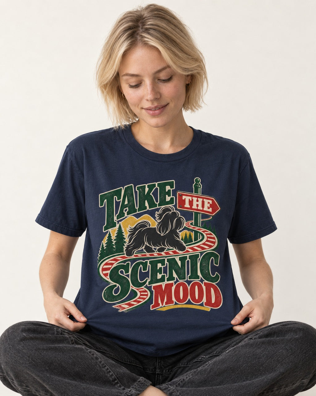 Shih Tzu Take the Scenic Mood Road Sign Graphic T-Shirt in Navy, worn by a seated model